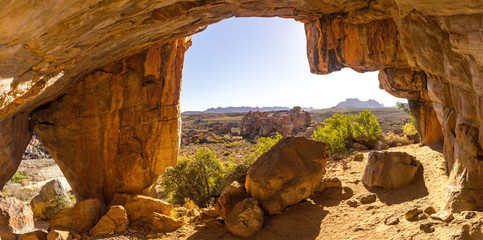 Panorama in a cave with view to mountains and bizarre rock formation, Truitjieskraal, Cederberg Wilderness Area, South Africa