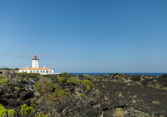 Fototapeta na wymiar Pico, Portugal - 12 July 2019: Lighthouse