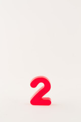 Red number two isolated on white background
