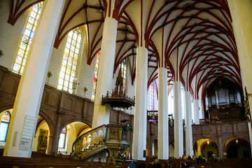 Interior of Lutheran St. Thomas Church Thomaskirche in Leipzig, Germany. November 2019