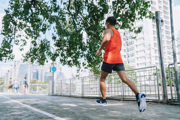 people doing exercises and warm up before running and jogging; Healthy lifestyle cardio together at outdoors