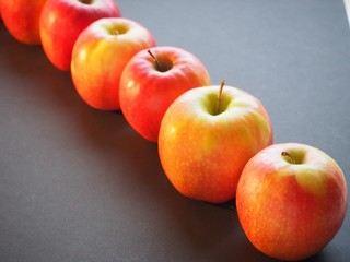 apples on black background