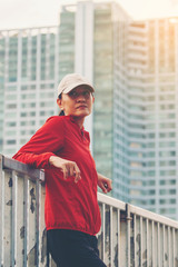 Young women runner on the street be running for exercise on city road; sport, people, exercising and lifestyle concept