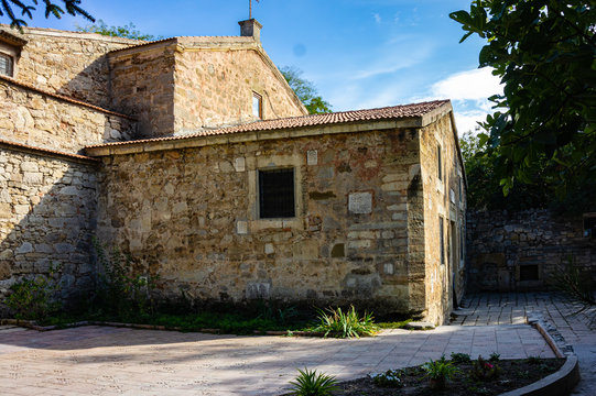 Medieval Armenian church of Sergius Sergius (Surb Sarkis) - in Feodosia. Famous artist-painter Aivazovsky is buried in courtyard of church. Feodosia, Crimea, Russia - September 26, 2019: 