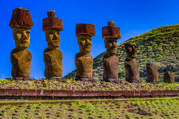 Fototapeta na wymiar Moai statues in the Rano Raraku Volcano in Easter Island, Rapa Nui National Park, Chile