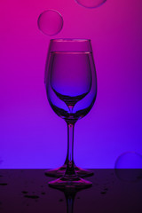 glass of wine on black background