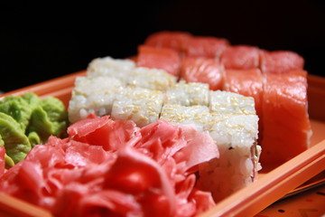 Delivery of sushi and rolls with seafood