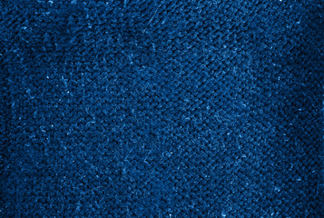 Blue knitting wool texture background. Color 2020 year