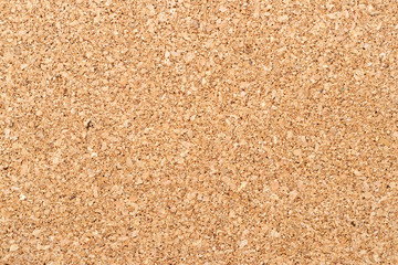 Brown yellow color of cork board textured background