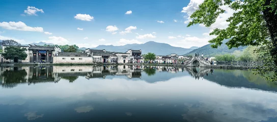 Photo sur Plexiglas Monts Huang Hongcun village scenery in Huangshan Anhui China. The village is an ancient village. It is located near Mount Huangshan. Hongcun is a famous historical village in China UNESCO heritage site.