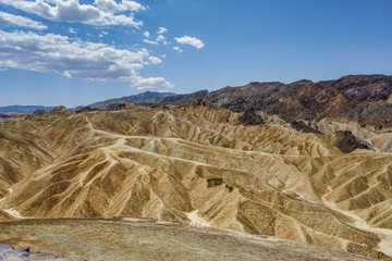 Zabriskie Point offers a stunning panorama of the badlands near Furnace Creek in Death Valley National Park, USA
