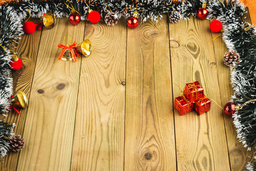 Christmas Decoration, Gifts tree branches and bells on wooden boards