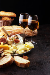 Different sorts of cheese. Cheese platter with different cheese and spice