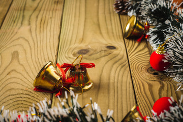 Christmas Decoration, Gifts tree branches and bells on wooden boards