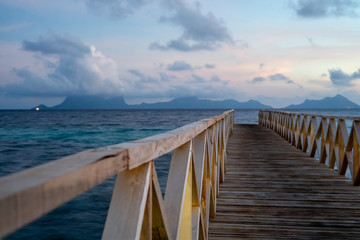 Obraz premium Wooden bridge during the sunset near the Bum bum island in Semporna, Borneo Sabah.