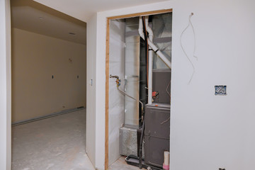 New home construction with installation of heating system in basement