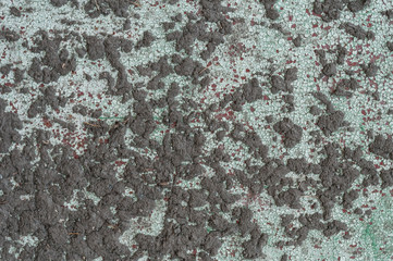 side view of dirty grungy painted cracked wall for background, texture and seamless 