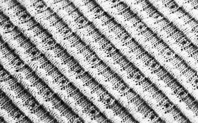 image of fabric texture on a lit background of different colors