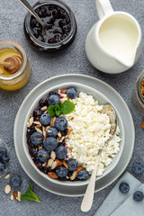 Cottage cheese with fresh berry, nuts and honey