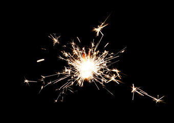 Burning sparkler isolated on black background - Powered by Adobe