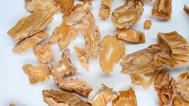 top view herb medicine BaiBu or Stemonae Radix or Japanese Stemona Root rotate and pause