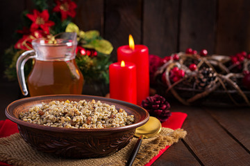 Kutya. Christmas porridge made of wheat grains, poppy seed, nuts, raisins and honey. Christmas kutia. Ukrainian cuisine.