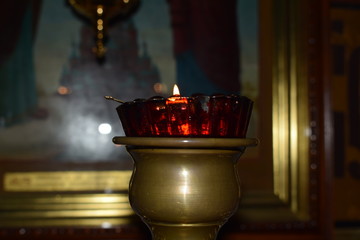 burning candle in the Church