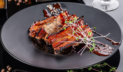 Concept of modern muslim cuisine. Lamb ribs for Ramadan or Kurban Bayram.
