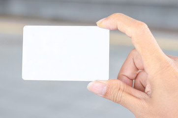 hand holding empty blank white business card mock up design text for advertisement  branding.