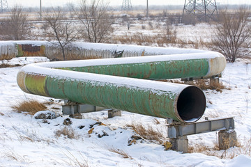 Cut pipe of large diameter, decommissioned. Winter, Russia. Industry