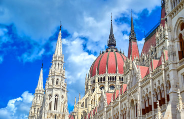 Fototapeta premium The Hungarian Parliament Building located on the Danube River in Budapest Hungary at sunset.