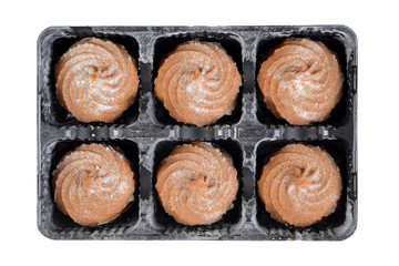 tray of gingerbread swirl cookies with icing sugar