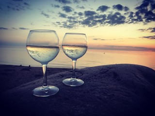 glass of wine on a background of blue sky