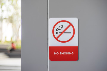 Label no smoking metal sign in the city