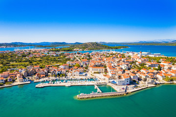 Naklejka na ściany i meble Adriatic coast in Dalmatia, Croatia, beautiful island of Murter and town of Betina from air, popular touristic destination