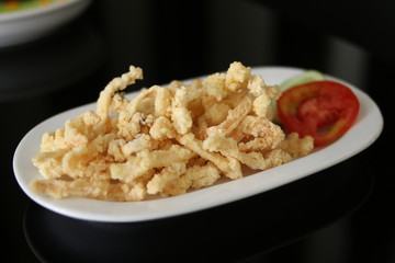 flour fried mushrooms or crispy mushrooms with tomato from left View