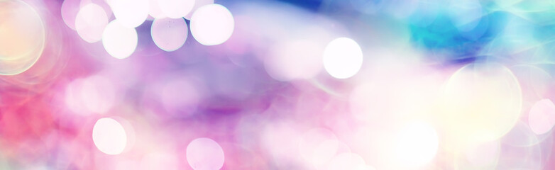 blurred bokeh city background / glare and glowing light in night city, modern beautiful bright background