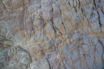 Stone mountain cliff texture. Rock texture background and wallpaper.