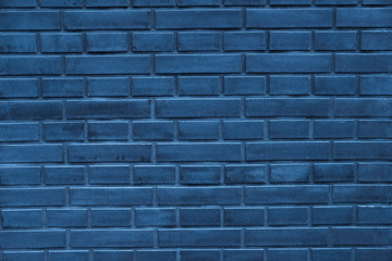 Bright blue beautiful new brick wall texture background. Close up, copy space