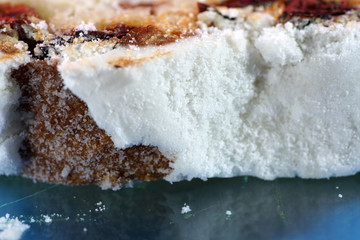 Bread shaped cake made of heavy yeast dough photographed in the studio with artificial light