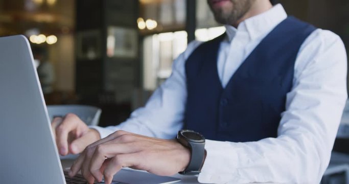 Young professional man in a cafe