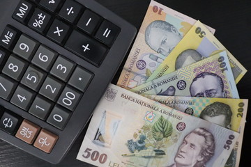 Romanian banknotes and calculator