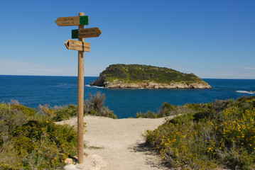 Hiking sign on Cap Prim with Portichol Island in background, Javea, Alicante Province, Spain