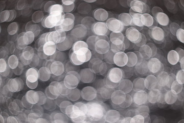 Abstract background obtained from crumpled foil with moving lighting and a defocused camera....