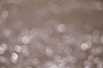 Abstract background obtained from crumpled foil with moving lighting and a defocused camera....