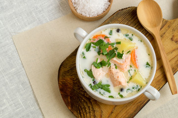 traditional salmon soup with vegetables and cream.