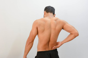 Obraz premium Man waist pain by exercise. 