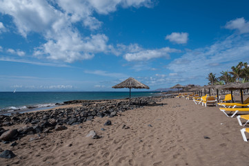 Sandy beach and open sea view.