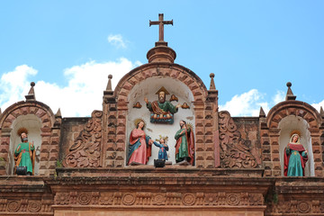Fototapeta na wymiar Impressive Ornate Facade of the Templo de la Sagrada Familia or Church of the Holy Family in Cusco, Peru