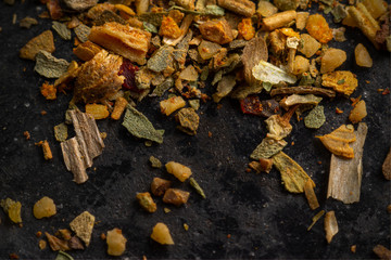 mix of spices close up on dark background